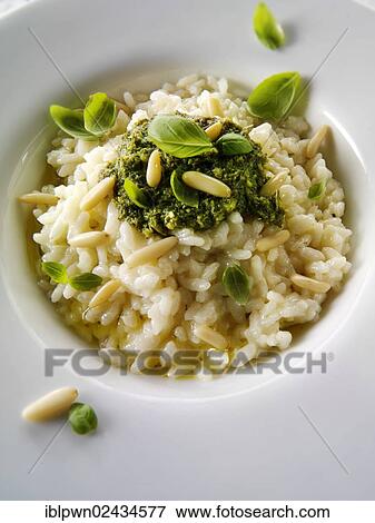 Classic risotto with pesto sauce View Large Photo Image Stock Photo - Classic risotto with pesto sauce. Fotosearch