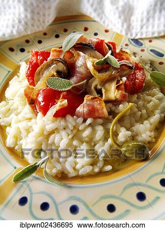 Classic risotto with pesto sauce View Large Photo Image Stock Photography - Classic risotto with pesto sauce. Fotosearch