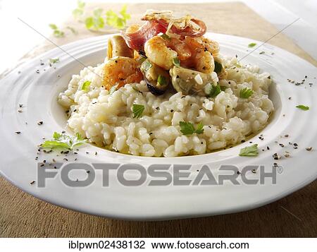 "Classic risotto with prawns, mussels and bacon" View Large Photo Image Stock Image - "Classic risotto with prawns, mussels and bacon". Fotosearch