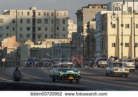 "Classic U. S. road cruiser driving along the Malecon, Havana's seaside promenade, Havana, La Habanna, Cuba, North America" View Large Photo Image Stock Image - "Classic U. S. road cruiser driving along the Malecon, Havana's seaside promenade, Havana, La Habanna, Cuba, North America". Fotosearch
