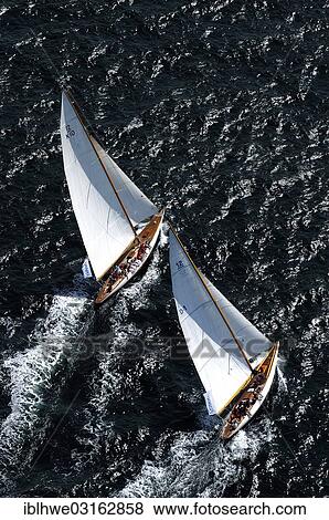 "Classic yachts, Thea and Trevia, during their match race, 12-metre yachts beating to windward, Kieler Forde, Kiel, Schleswig-Holstein, Germany, Europe" View Large Photo Image Stock Photo - "Classic yachts, Thea and Trevia, during their match race, 12-metre yachts beating to windward, Kieler Forde, Kiel, Schleswig-Holstein, Germany, Europe". Fotosearch