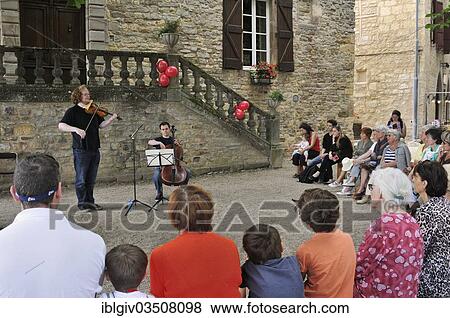 "Classical concert taking place in the town hall square of Cordes-sur-Ciel, Cordes-sur-Ciel, Departement Tarn, Midi-Pyrenees, France, Europe" View Large Photo Image Stock Photo - "Classical concert taking place in the town hall square of Cordes-sur-Ciel, Cordes-sur-Ciel, Departement Tarn, Midi-Pyrenees, France, Europe". Fotosearch