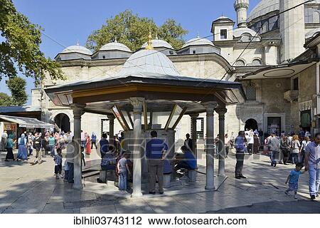 Stock Image - "Cleaning wells for washing feet, ablution, at Eyuep Sultan Mosque, Eyup, Istanbul, European side, Istanbul Province, Turkey, European side, Europe". Fotosearch