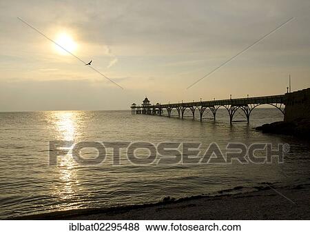 "Clevedon Pier at sunset, Clevedon, Somerset, England, United Kingdom, Europe" View Large Photo Image Stock Photo - "Clevedon Pier at sunset, Clevedon, Somerset, England, United Kingdom, Europe". Fotosearch