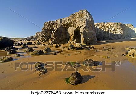 "Cliffs and beach at the Cote Sauvage on the west side of the Quiberon peninsula, southern Brittany, Bretagne, France, Europe" View Large Photo Image Stock Image - "Cliffs and beach at the Cote Sauvage on the west side of the Quiberon peninsula, southern Brittany, Bretagne, France, Europe". Fotosearch