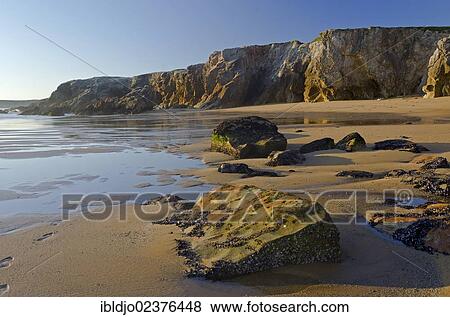 "Cliffs and beach at the Cote Sauvage on the west side of the Quiberon peninsula, southern Brittany, Bretagne, France, Europe" View Large Photo Image Stock Photo - "Cliffs and beach at the Cote Sauvage on the west side of the Quiberon peninsula, southern Brittany, Bretagne, France, Europe". Fotosearch