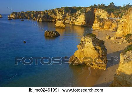 Stock Image - "Cliffs at the Praia da Dona Ana beach, Lagos, Algarve, Portugal, Europe". Fotosearch
