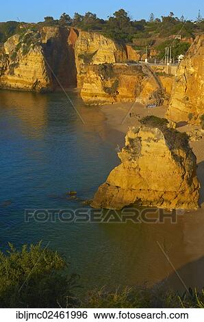 Stock Photograph - "Cliffs at the Praia da Dona Ana beach, Lagos, Algarve, Portugal, Europe". Fotosearch