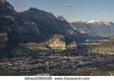 "Cliffs with the ruins of Arco Castle or Castello di Arco above Arco, Sarca Valley, Trentino-Alto Adige, Italy, Europe" View Large Photo Image Stock Photograph - "Cliffs with the ruins of Arco Castle or Castello di Arco above Arco, Sarca Valley, Trentino-Alto Adige, Italy, Europe". Fotosearch