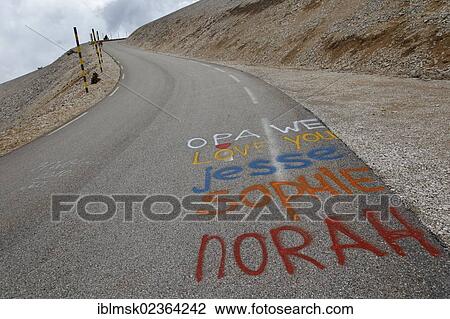 Stock Image - "Climb to the summit of Mont Ventoux, words sprayed on the road to encourage cyclists, Carpentras, Provence region, Departement Vaucluse, France, Europe". Fotosearch