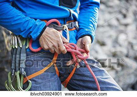 "Climber attaching a figure of eight knot on his climbing rope, Martinswand climbing are, Zirl, Tyrol, Austria, Europe" View Large Photo Image Stock Image - "Climber attaching a figure of eight knot on his climbing rope, Martinswand climbing are, Zirl, Tyrol, Austria, Europe". Fotosearch