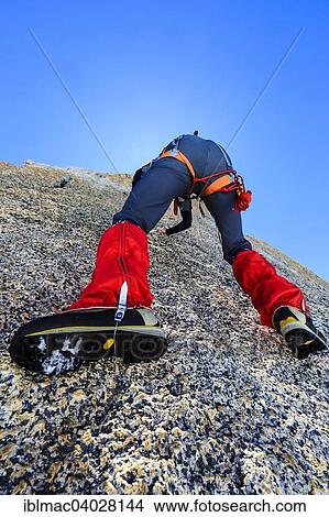 "Climber climbing on a rock wall, alpine climb, Alps, below the summit, Petite Forch, Canton of Valais, Switzerland, Europe" View Large Photo Image Picture - "Climber climbing on a rock wall, alpine climb, Alps, below the summit, Petite Forch, Canton of Valais, Switzerland, Europe". Fotosearch