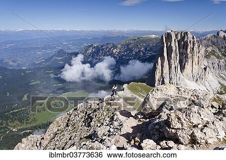 "Climber on the Croda Rossa Via Ferrata, Niger Pass below, Mt Tscheiner-Spitze or Cima Sforcella, right, Dolomites, Trentino-Alto Adige, Italy, Europe" View Large Photo Image Stock Photograph - "Climber on the Croda Rossa Via Ferrata, Niger Pass below, Mt Tscheiner-Spitze or Cima Sforcella, right, Dolomites, Trentino-Alto Adige, Italy, Europe". Fotosearch