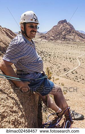 "Climber resting, Spitzkoppe area, Namibia, Africa" View Large Photo Image Stock Photo - "Climber resting, Spitzkoppe area, Namibia, Africa". Fotosearch