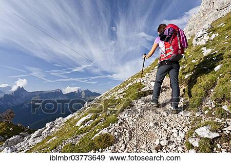 Stock Photo - "Climber, Via Ferrata Giuseppe di Olivieri, Dolomites, Belluno, Italy, Europe". Fotosearch