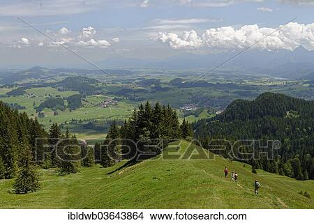 "Climbers and views from Kappeler Alp below Mt Edelsberg and Mt Alpspitze, Kappeler Alp, Nesselwang, Swabia, Bavaria, Germany, Europe" View Large Photo Image Picture - "Climbers and views from Kappeler Alp below Mt Edelsberg and Mt Alpspitze, Kappeler Alp, Nesselwang, Swabia, Bavaria, Germany, Europe". Fotosearch