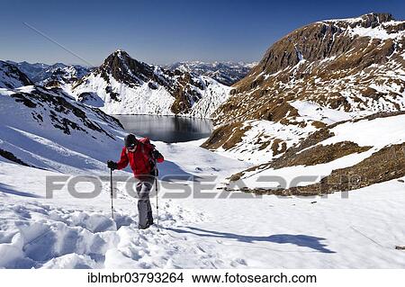 "Climbers ascending to the Wilde Kreuzspitze in the Pfunderer mountains, behind the Lago Selvaggio lake and the Kalkgrubenspitze, Eisacktal, South Tyrol, Italy, Europe" View Large Photo Image Picture - "Climbers ascending to the Wilde Kreuzspitze in the Pfunderer mountains, behind the Lago Selvaggio lake and the Kalkgrubenspitze, Eisacktal, South Tyrol, Italy, Europe". Fotosearch