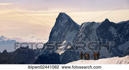 "Climbers leaving Alguille du Midi for the Mont Blanc Massif, Chamonix Mont Blanc, France, Europe" View Large Photo Image Stock Image - "Climbers leaving Alguille du Midi for the Mont Blanc Massif, Chamonix Mont Blanc, France, Europe". Fotosearch