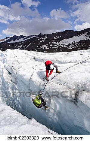"Climbers on Zufallferner glacier at a crevasse rescue, Martelltal valley, province of Bolzano-Bozen, Italy, Europe" View Large Photo Image Stock Image - "Climbers on Zufallferner glacier at a crevasse rescue, Martelltal valley, province of Bolzano-Bozen, Italy, Europe". Fotosearch