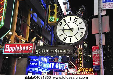 "Clock and neon signs, Times Square, New York City, New York, United States, North America" View Large Photo Image Stock Image - "Clock and neon signs, Times Square, New York City, New York, United States, North America". Fotosearch
