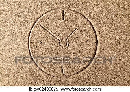 Stock Photography - "Clock, drawn in sand". Fotosearch