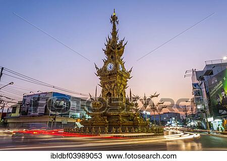 "Clock Tower at sunset, with light trails of vehicles, Wiang Mueang, Chiang Rai Province, Chiang Rai Province, Northern Thailand, Thailand, Asia" View Large Photo Image Stock Image - "Clock Tower at sunset, with light trails of vehicles, Wiang Mueang, Chiang Rai Province, Chiang Rai Province, Northern Thailand, Thailand, Asia". Fotosearch