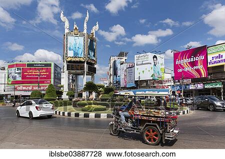 "Clock tower, tuk-tuk at a roundabout, Udon Thani, Isan or Isaan, Thailand, Asia" View Large Photo Image Stock Photo - "Clock tower, tuk-tuk at a roundabout, Udon Thani, Isan or Isaan, Thailand, Asia". Fotosearch