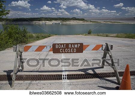 "Closed boat ramp at Mansfield Dam Park, an extreme drought which has lowered the water level in Lake Travis by nearly 60 feet, Austin, Texas, United States, North America" View Large Photo Image Stock Photo - "Closed boat ramp at Mansfield Dam Park, an extreme drought which has lowered the water level in Lake Travis by nearly 60 feet, Austin, Texas, United States, North America". Fotosearch