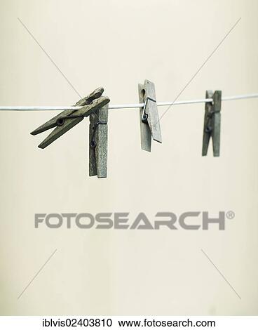 Clothesline and clothes pegs View Large Photo Image Stock Image - Clothesline and clothes pegs. Fotosearch