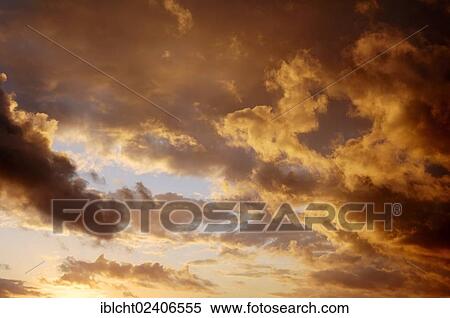 Stock Photography - "Clouds at sunset, North Rhine-Westphalia, Germany, Europe". Fotosearch