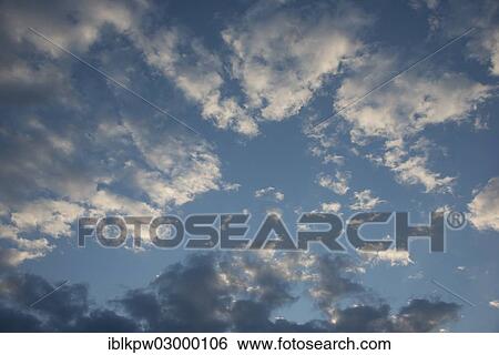 "Clouds in the evening sky, Germany, Europe" View Large Photo Image Stock Photograph - "Clouds in the evening sky, Germany, Europe". Fotosearch
