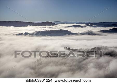 "Clouds in the valleys of the Sauerland region near Meschede, Sauerland region, North Rhine-Westphalia, Germany, Europe" View Large Photo Image Picture - "Clouds in the valleys of the Sauerland region near Meschede, Sauerland region, North Rhine-Westphalia, Germany, Europe". Fotosearch