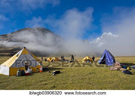"Clouds, morning mist at a hikers' tent camp, Cordillera Huayhuash mountain range, Northern Peru, Peru, South America" View Large Photo Image Stock Image - "Clouds, morning mist at a hikers' tent camp, Cordillera Huayhuash mountain range, Northern Peru, Peru, South America". Fotosearch