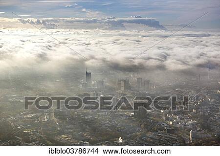 Picture - "Clouds over the city centre of Essen, aerial view, Essen, Ruhr area, North Rhine-Westphalia, Germany, Europe". Fotosearch