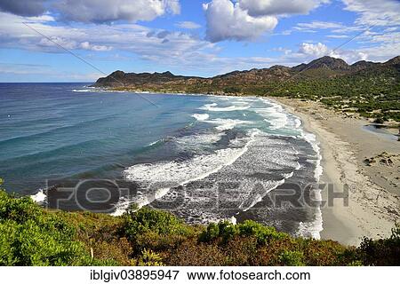 Stock Photo - "Clouds over the deserted beach of Ostriconi, Balagne, Corsica, France, Europe". Fotosearch