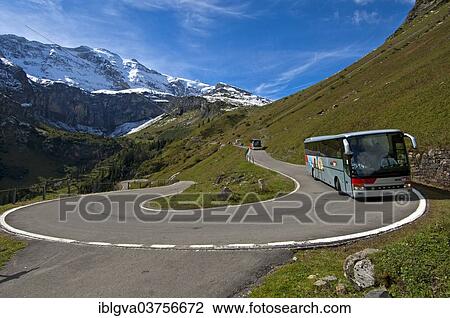 Coach In A Hairpin Curve Mountain Road To The Klausen Pass In