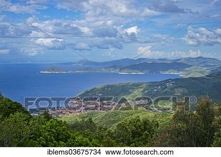 "Coast of Elba and town view of Marciana Marina, Marciana Marina, Elba, Provinz Livorno, Toskana, Italy, Europe" View Large Photo Image Picture - "Coast of Elba and town view of Marciana Marina, Marciana Marina, Elba, Provinz Livorno, Toskana, Italy, Europe". Fotosearch