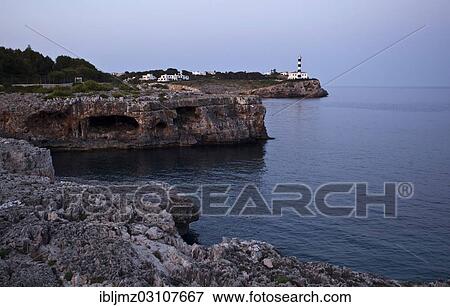 "Coast with a lighthouse, Portocolom, Mallorca, Majorca, Balearic Islands, Spain, Europe" View Large Photo Image Stock Photo - "Coast with a lighthouse, Portocolom, Mallorca, Majorca, Balearic Islands, Spain, Europe". Fotosearch