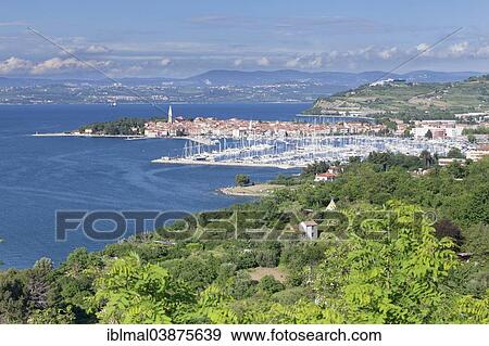 "Coast with old town of Izola, Slovenian Littoral, Istria, Slovenia, Europe" View Large Photo Image Stock Photo - "Coast with old town of Izola, Slovenian Littoral, Istria, Slovenia, Europe". Fotosearch