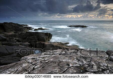 "Coastal cliffs and rocks of the Atlantic Ocean in the evening, Northern Highlands, Highlands, Sutherland County, Highland, Scotland, United Kingdom, Europe" View Large Photo Image Stock Photography - "Coastal cliffs and rocks of the Atlantic Ocean in the evening, Northern Highlands, Highlands, Sutherland County, Highland, Scotland, United Kingdom, Europe". Fotosearch