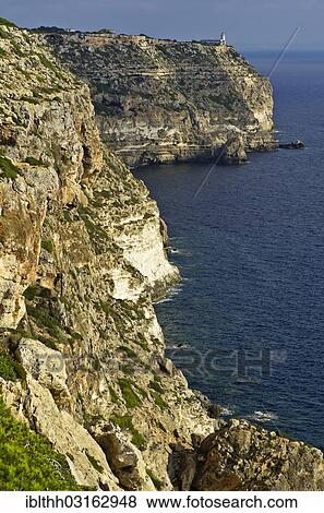 "Coastal cliffs with a lighthouse at Cabo Blanco, Tolleric, Majorca, Balearic Islands, Spain, Europe" View Large Photo Image Stock Photo - "Coastal cliffs with a lighthouse at Cabo Blanco, Tolleric, Majorca, Balearic Islands, Spain, Europe". Fotosearch