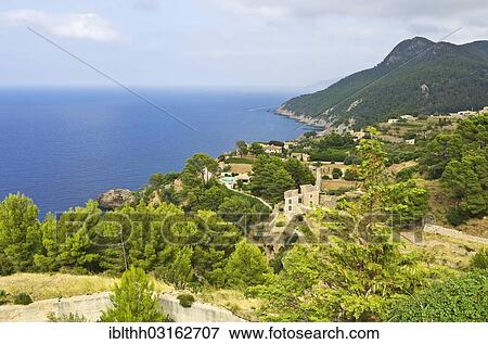 "Coastal landscape of the Serra de Tramuntana, UNESCO World Heritage Site, Estellencs, Sierra de Tramuntana, Majorca, Balearic Islands, Spain, Europe" View Large Photo Image Stock Photo - "Coastal landscape of the Serra de Tramuntana, UNESCO World Heritage Site, Estellencs, Sierra de Tramuntana, Majorca, Balearic Islands, Spain, Europe". Fotosearch