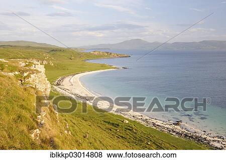 Stock Photo - "Coastal landscape with rocks in the evening light, Schottland, Isle of Skye, Scotland, United Kingdom, Europe". Fotosearch