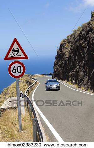 Stock Image - "Coastal road at the cliffs near El Risco, Artenara Region, Gran Canaria, Canary Islands, Spain, Europe, PublicGround, Europe". Fotosearch