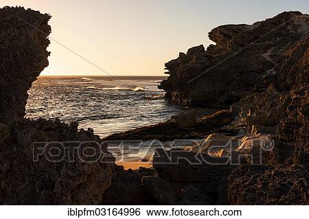 Stock Photograph - "Coastal sandstone formations in evening light, Margaret River, Western Australia, Australia, Oceania". Fotosearch