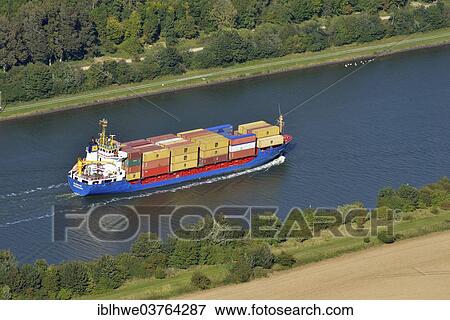 "Coaster Sereno at the Kiel Canal, Rendsburg, Schleswig-Holstein, Germany, Europe" View Large Photo Image Stock Photo - "Coaster Sereno at the Kiel Canal, Rendsburg, Schleswig-Holstein, Germany, Europe". Fotosearch
