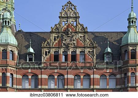 "Coat of arms, so-called harbor town hall in neo-Renaissance style, headquarters of HHLA, Speicherstadt historic warehouse district, Hamburg, Germany, Europe" View Large Photo Image Stock Image - "Coat of arms, so-called harbor town hall in neo-Renaissance style, headquarters of HHLA, Speicherstadt historic warehouse district, Hamburg, Germany, Europe". Fotosearch