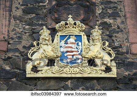 "Coat of arms with lions on the facade of Altes Hofbrauhaus restaurant, Steinheim am Main, Hanau, Hesse, Germany, Europe" View Large Photo Image Stock Photo - "Coat of arms with lions on the facade of Altes Hofbrauhaus restaurant, Steinheim am Main, Hanau, Hesse, Germany, Europe". Fotosearch