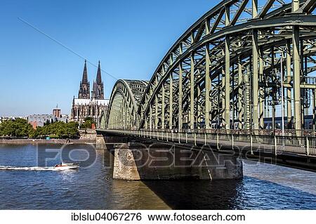 Stock Photograph - "Cologne Cathedral, the Rhine and Hohenzollern Bridge, Cologne, North Rhine-Westphalia, Germany, Europe". Fotosearch