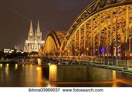 "Cologne Cathedral with Hohenzollern Bridge and Cologne Philharmonic Hall, the Rhine at the front, at night, Cologne, North Rhine-Westphalia, Germany, Europe" View Large Photo Image Stock Photo - "Cologne Cathedral with Hohenzollern Bridge and Cologne Philharmonic Hall, the Rhine at the front, at night, Cologne, North Rhine-Westphalia, Germany, Europe". Fotosearch